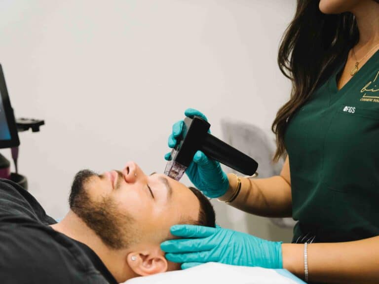Male client receiving hydrafacial treatment at a cosmetic clinic Parramatta for skin rejuvenation.
