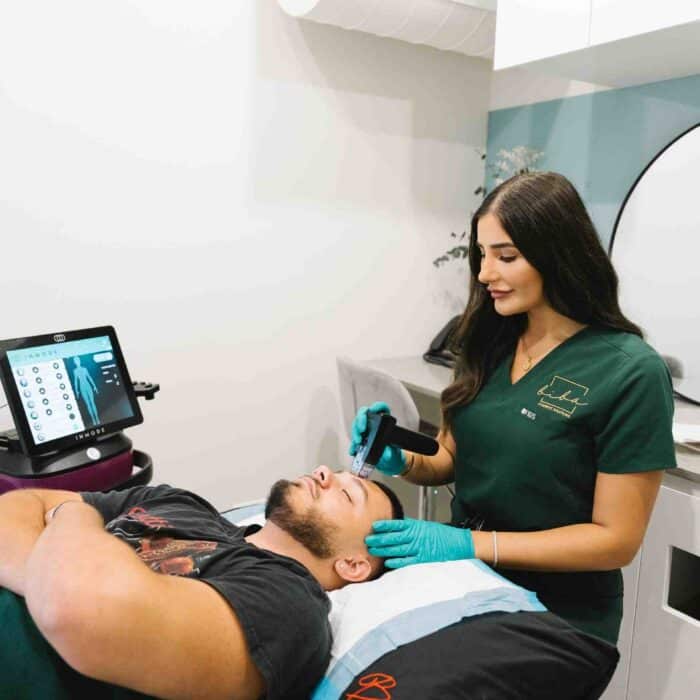 Male patient undergoing a hydrafacial treatment at a Parramatta cosmetic clinic.