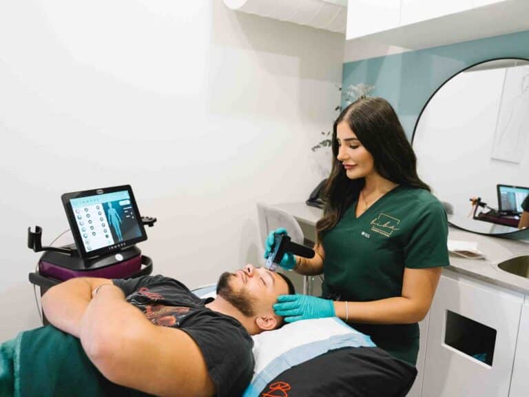 Male client receiving hydrafacial treatment at a Parramatta cosmetic clinic to rejuvenate skin.