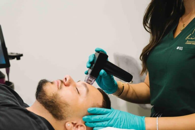 A male client undergoing hydrafacial treatment at a Parramatta cosmetic clinic to rejuvenate his skin.