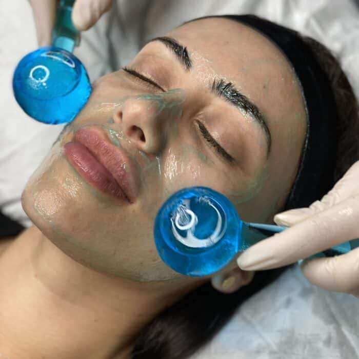 Fire and Ice facial treatment in progress, focusing on renewing and rejuvenating the client’s skin.