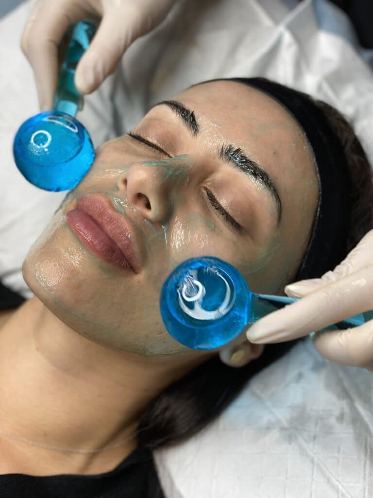 Fire and Ice facial treatment in progress, focusing on renewing and rejuvenating the client’s skin.