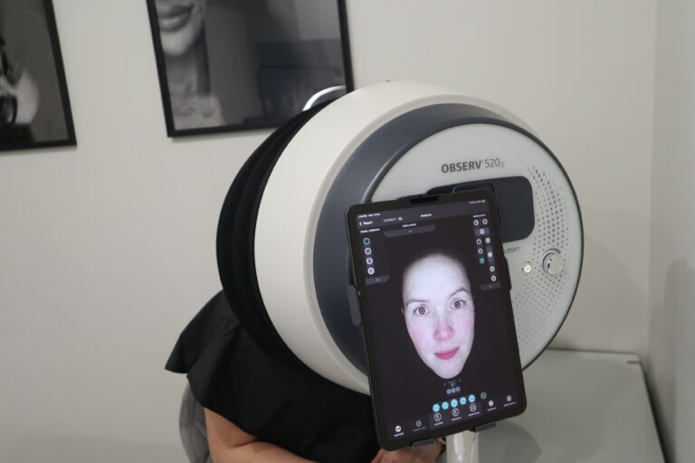A client's skin check using an EmpowerRF camera system.