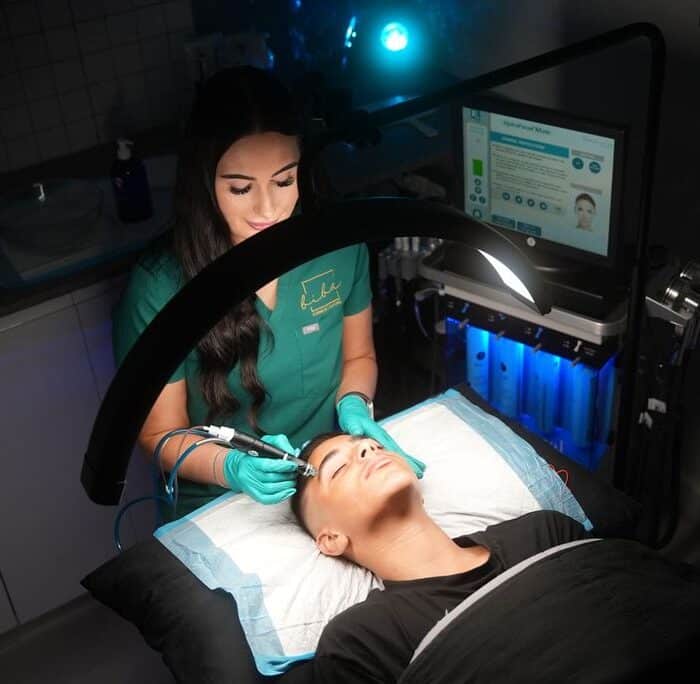 Client undergoing a Hydrafacial skin treatment